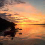 A kayaker at sunset - The best sunset in the west - 1/2mile from base.